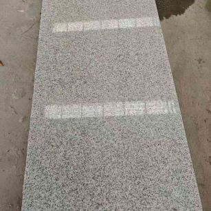 怀化芝麻白光面毛板